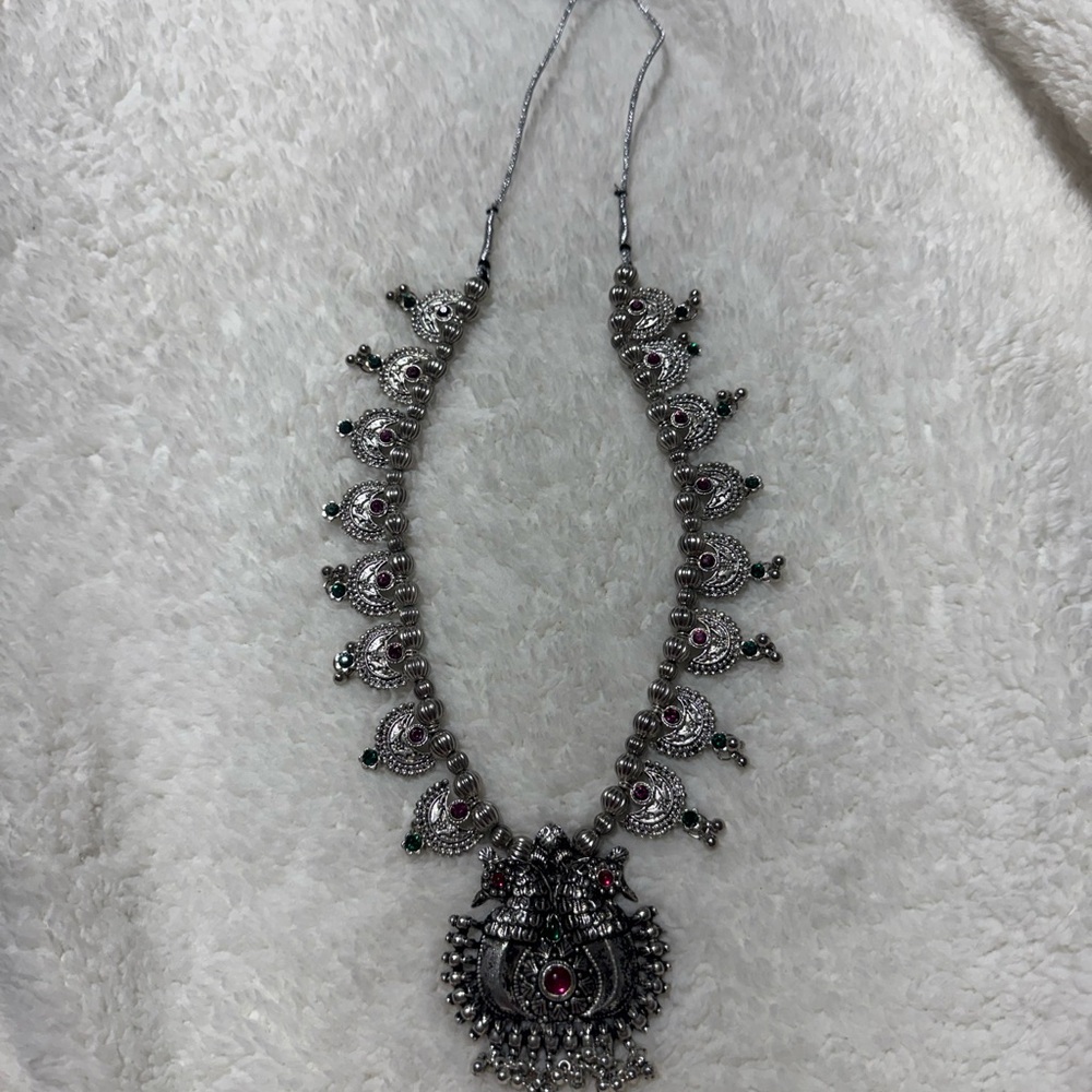 Elegant Silver Necklace with Red Accents
